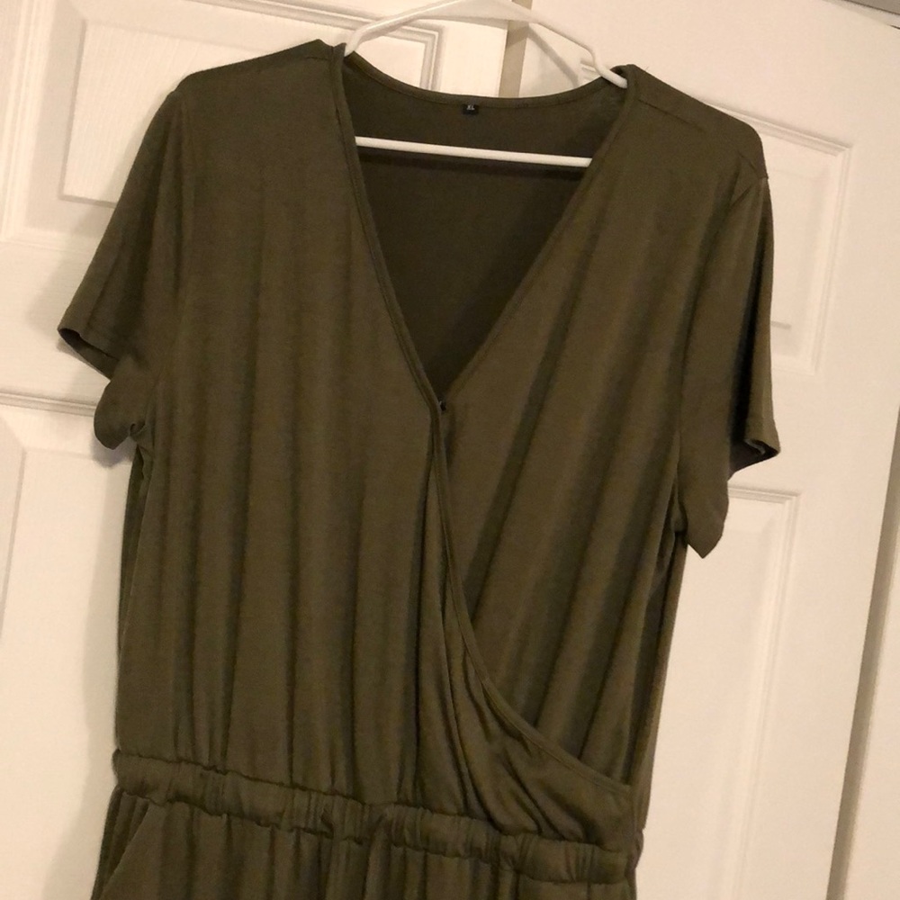 Green jumpsuit with side pockets